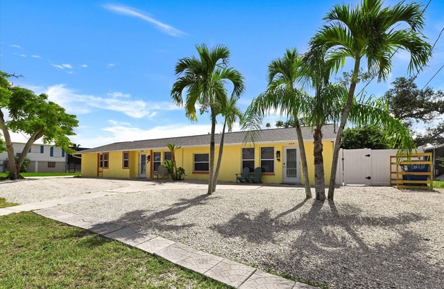 Convenient fully renovated ground floor pool home, just steps from the beach!