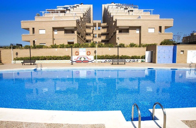 Cosy apartment for 4 guests with A/C, pool, TV, terrace, pets allowed and parking