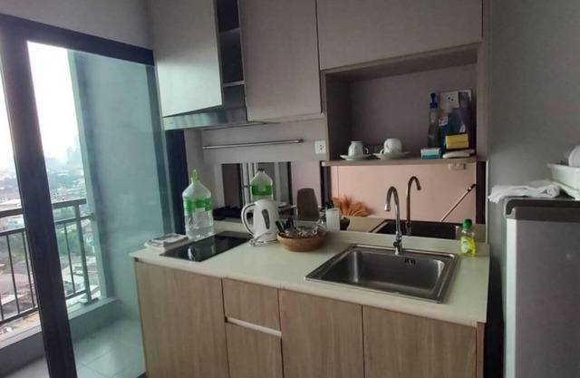 Cozy 1-bedroom condo with AC and fitness room in charming Bangkok