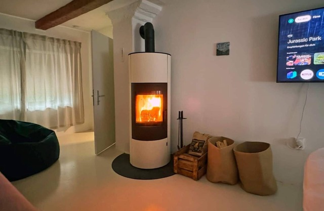 Cozy Bavarian home with fireplace and fully equipped kitchen.