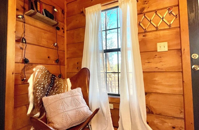 Cozy cabin and contemporary container home on one property! Pets welcome!