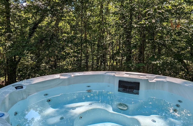 Cozy chalet in Biron with a private spa and shared pool