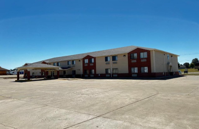 Designer Inn and Suites