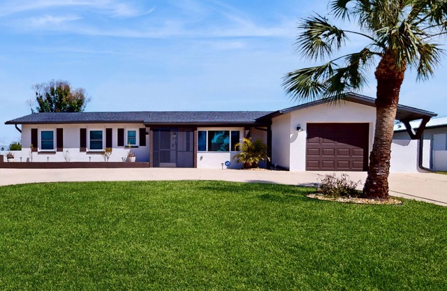 Dog friendly Rotonda West Retreat with saltwater pool and golf cart