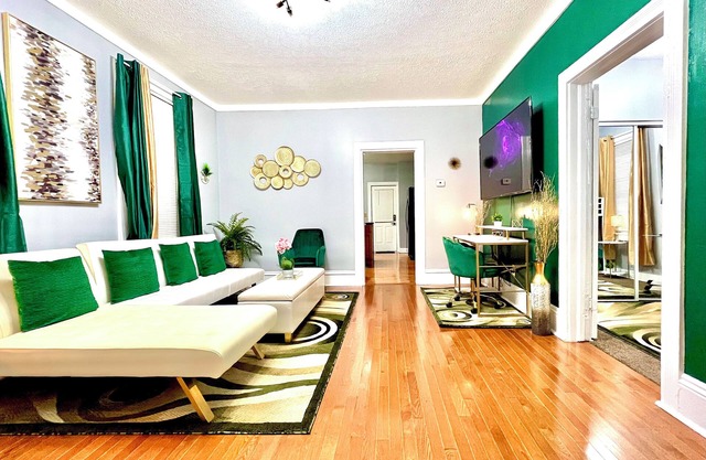 Emerald Oasis: Stylish Tremont 2BR Lower Unit by Christmas Story House | Parking 7 Min to Downtown