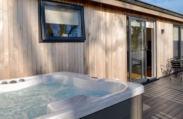 Enjoy a rural Scottish retreat in this charming detached lodge, with its stunning views and spacious