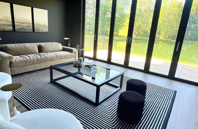Escape to serenity at our Pondside Modern House