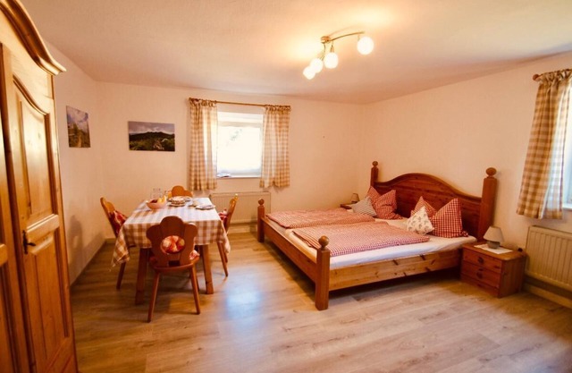 Family apartment with one bedroom and one bed-sitting room