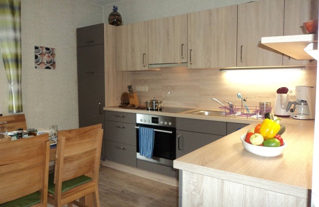 Ferienhaus für bis zu 8 Personen mit Balkon, Terrasse und kleinem Garten