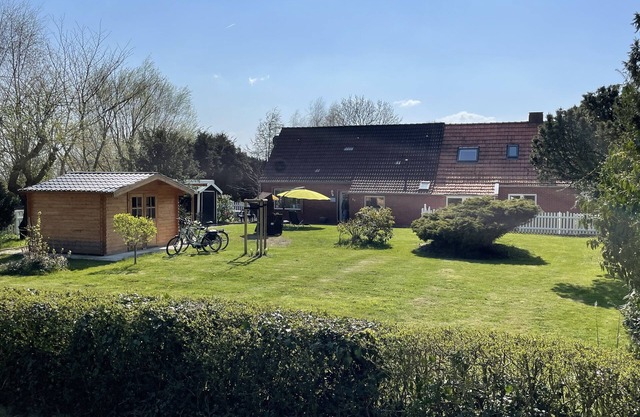 Ferienhaus Muschel mit Garten an der Nordsee