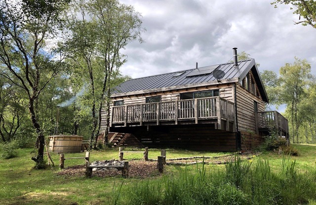 Flora is a Well equipped, Scandinavian style log cabin with wood fired hot tub