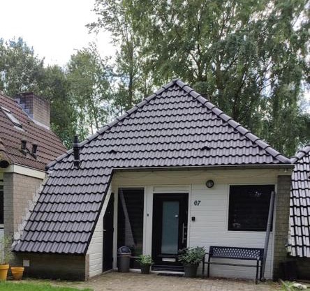 Geschakelde recreatiewoning met omheinde tuin
