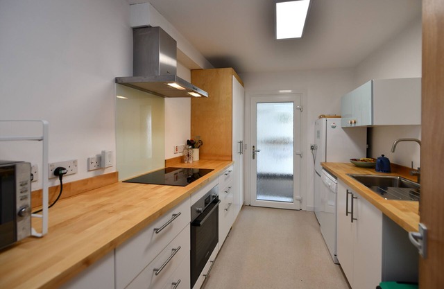Ground floor, 2 bedroom flat in converted pub. Partly disabled friendly.