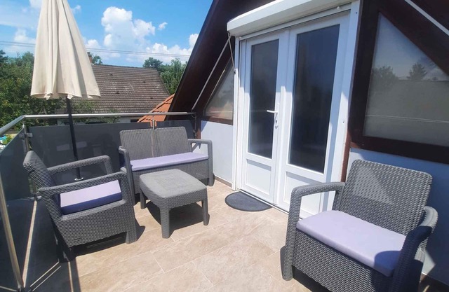 Holiday apartment with garden and balcony