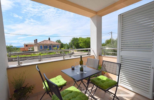 Holiday apartment with balcony and air conditioning
