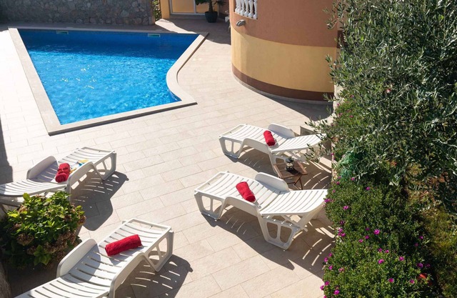 Holiday apartment with use of pool