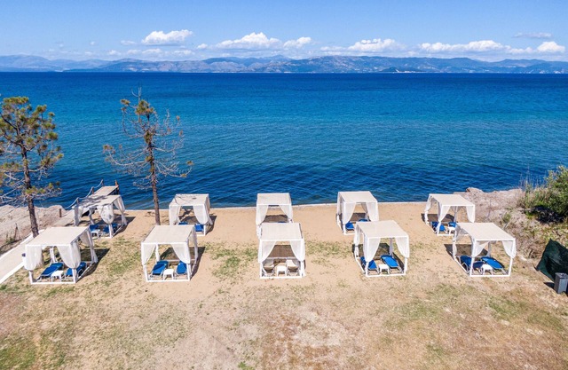 Holiday Home 'Sandy Beach House-1st Floor' with Shared Pool, Wi-Fi and Air Conditioning