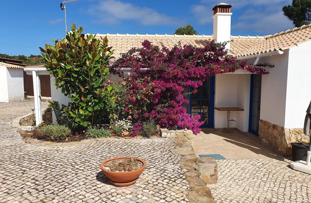 Holiday home with garden and pool, quietly located in a nature reserve