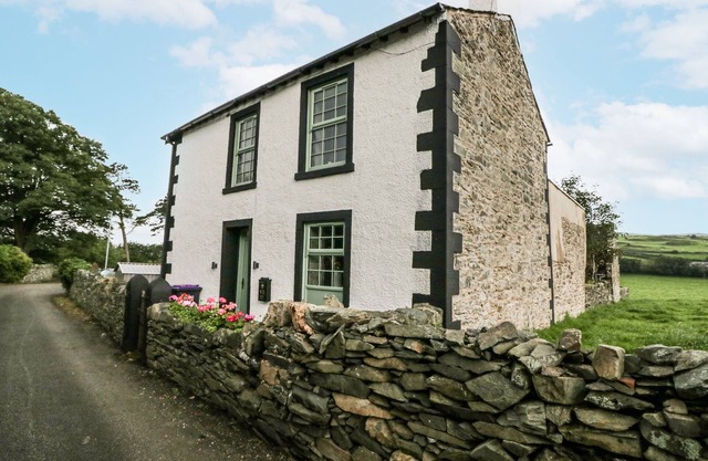 HOLY TRINITY COTTAGE, pet friendly, with open fire in Millom, Cumbria
