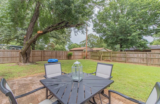 House with fenced-in backyard near educational & medical institutions in Conway.