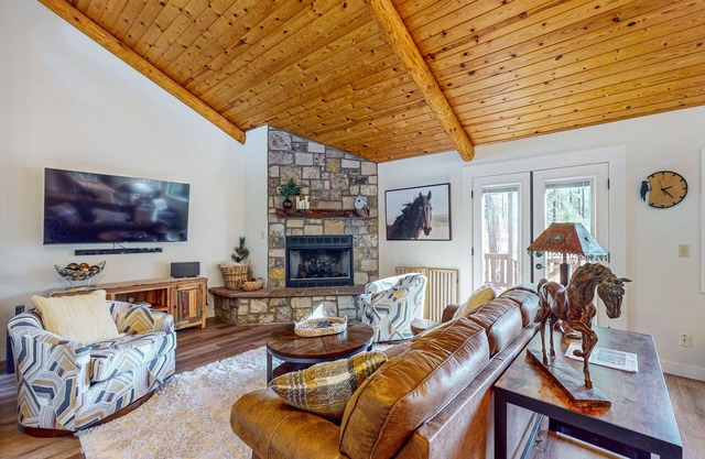 Immerse yourself in the charm of this delightful cabin tucked among the pines