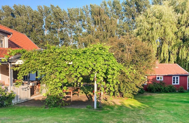 In idyllic location, surrounded by apple orchards and water on the property, this comfortable and co