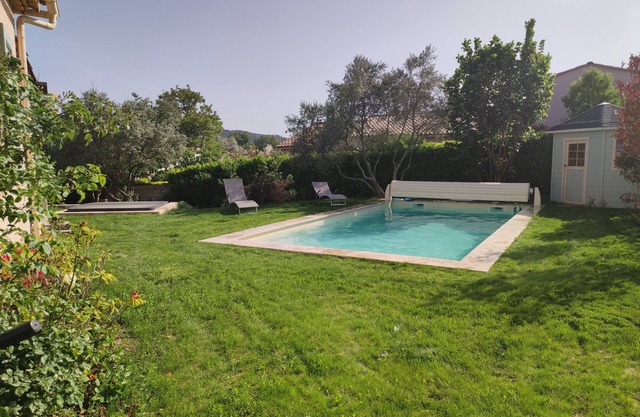 In the heart of a Provencal village house of 130m2 with large pool