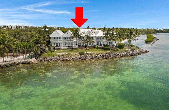 Indigo Reef Resort Premium Waterfront Villa 65 with Boat Dockage, Pool, and Sunset-View