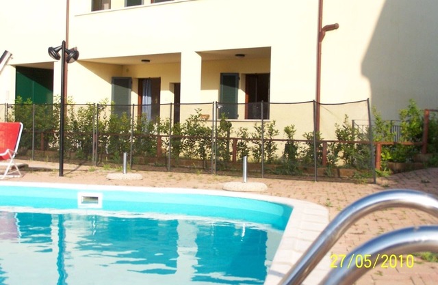 Isola Rossa - Two-room apartment Ground Floor with garden and swimming pool