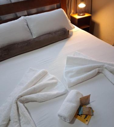 Kitnet Completa perto da Praia e do Centro, Roupas de Cama e Banho