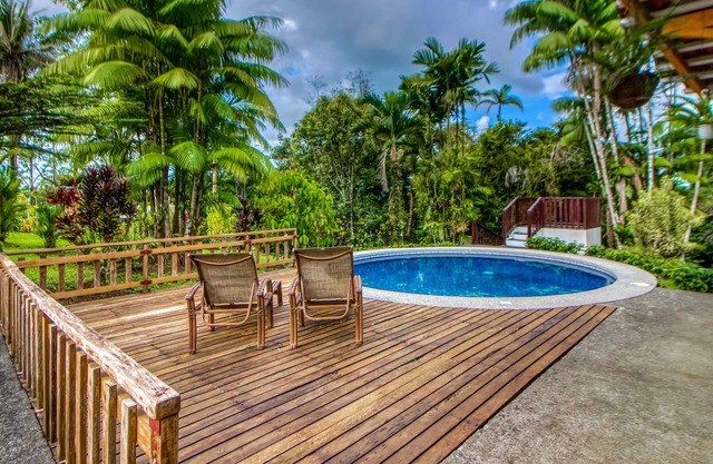 Large Home Set Into Lush Landscape with Private Pool & Gorgeous Deck Area