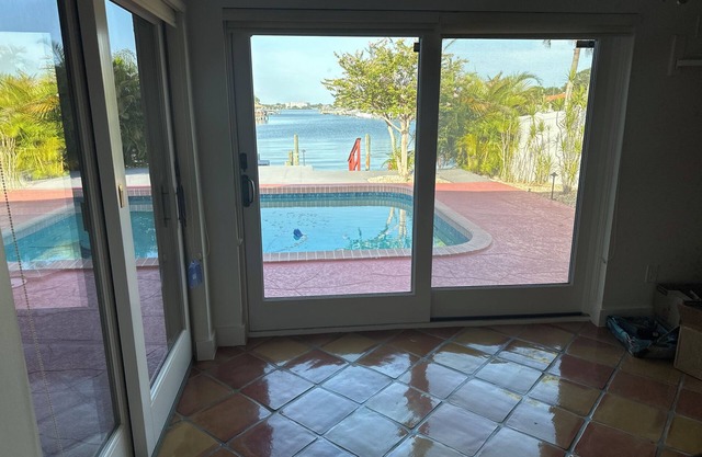 Large House with nice boat dock plus walk/ride a bike to Clearwater Beach