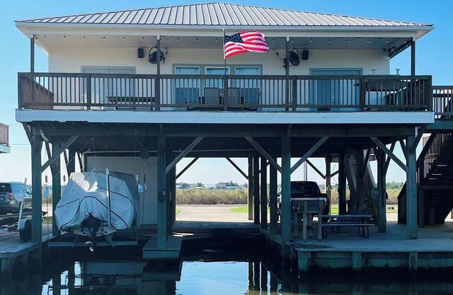 Located on Private Canal 411 Lake Breeze