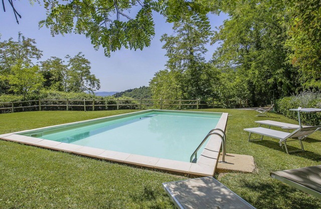 Lovely apartment in villa for 3 guests with WIFI, pool, TV, terrace, pets allowed and parking