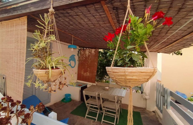 Lovely little house in the heart of Pomonte, just a few steps from the sea