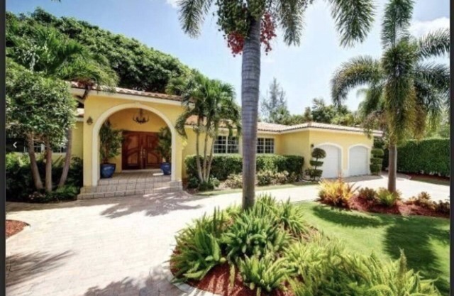 Lush gardens on the Earmen River with heated pool