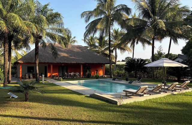 Magnificent oceanfront villa with private pool and wooded garden.