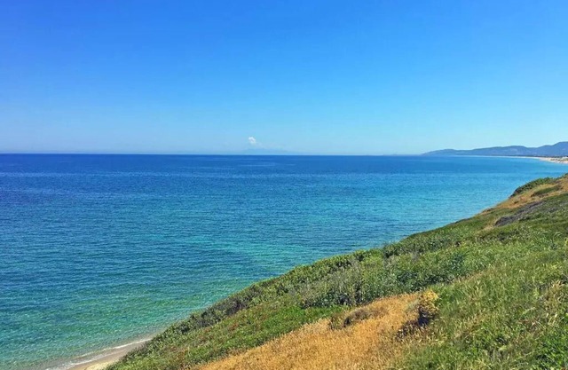 Mediterranean holiday homes by the sea in a quiet location, with garden & grill