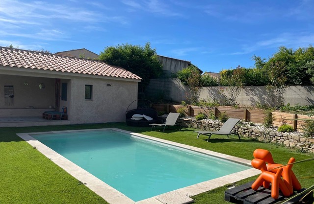 Modern 110m2 air-conditioned house with garden and private heated pool.