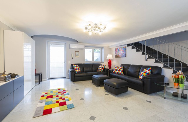 Modern apartment in Chiaia on two levels with panoramic terrace