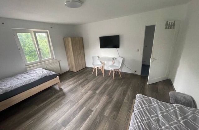 Modern double rooms with TV, WiFi, shared bathroom and kitchen