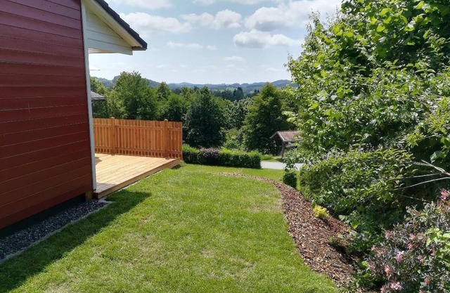 Modernes und gemütliches Holzhaus mit Kaminofen