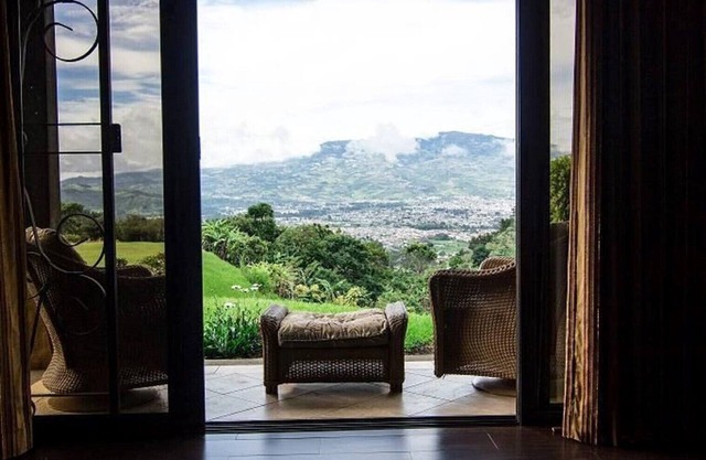 Mountain Luxury Mansion valley and city lights view.