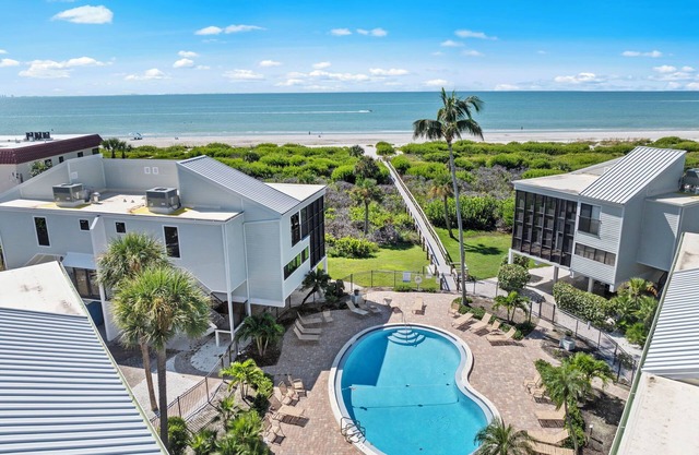 New Cyprina #2 – a fully renovated luxury townhome on Sanibel’s East End. Enjoy coastal elegance, modern comfort, and breathtaking direct water views from every room in this stunning beach retreat.