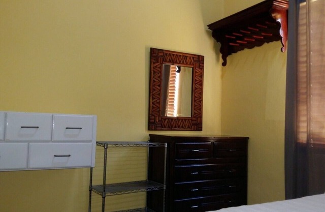 Nice & private in our backyard with own entry & parking lot.