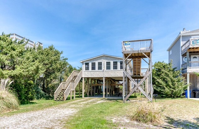 Oceanside cottage just a short walk to the beach with a community pool!