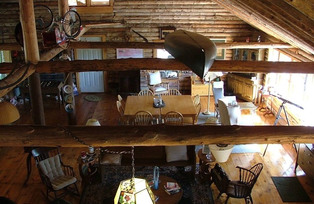 Private, on the water beautiful log cabin, 815 feet of water frontage, 16 acres