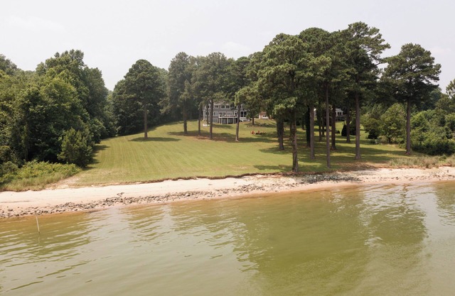 Private waterfront escape with endless river views, white sand beach and more!