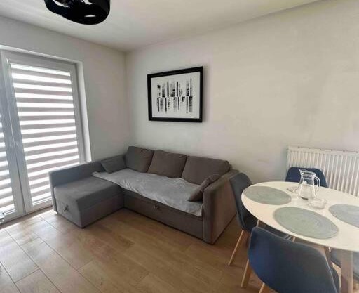 Przytulny apartament z dużym balkonem