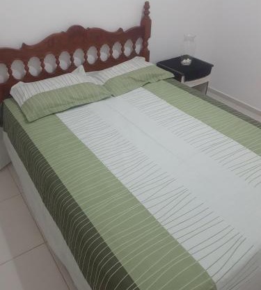 Quarto em apartamento